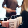 Bottles of styling products in a hair salon Bottles of styling products in a hair salon